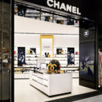 Chanel perfume and beauty boutique interior with Chanel logo display and luxury cosmetic products If you want a slightly more keyword-focused version for ranking:
