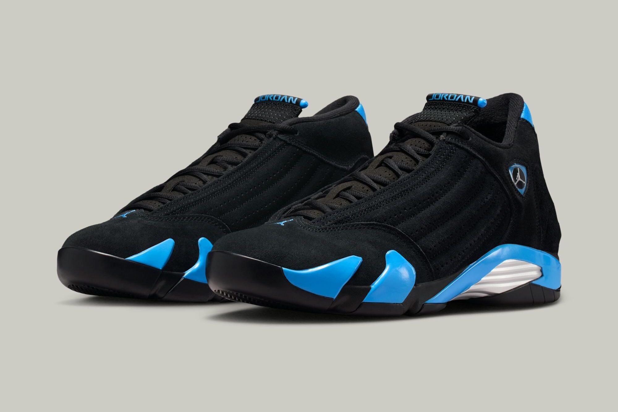 Air Jordan 14 Black University Blue sneakers with black suede upper and blue accents on sole and heel, side view product image